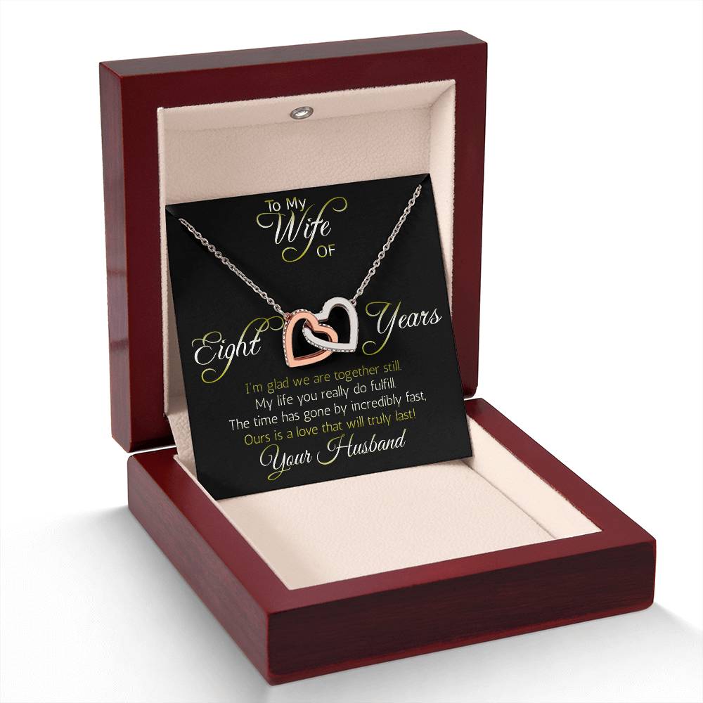 Amazing Eight year anniversary Gift: nterlocking hearts pendant; Love that will truly last.