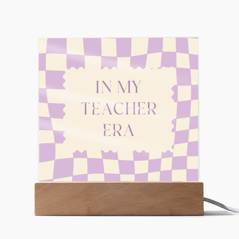 In my Teacher Era retro purple and cream decoration for classroom
