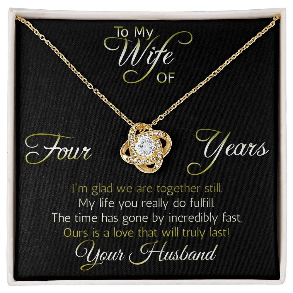 Four year anniversary necklace pendant, Love Knot... Love that will truly last. Show her that your love is intertwined!