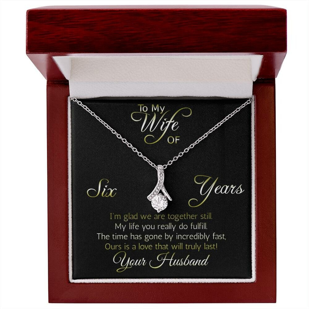 Fantastic 6 year anniversary gift: Aluring Beauty ribbon pendant reminds her that your love everlasting!