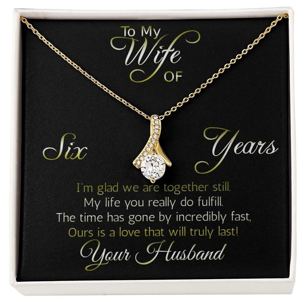 Fantastic 6 year anniversary gift: Aluring Beauty ribbon pendant reminds her that your love everlasting!