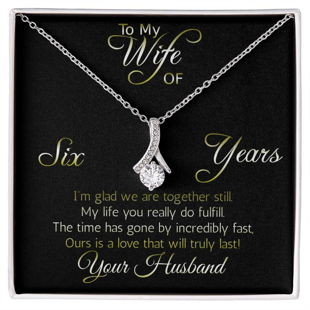Fantastic 6 year anniversary gift: Aluring Beauty ribbon pendant reminds her that your love everlasting!