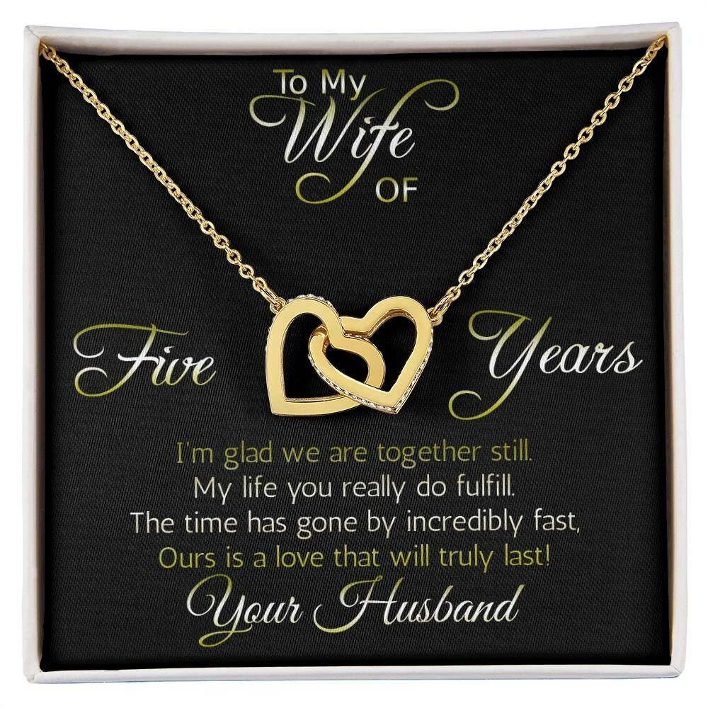 Awesome anniversary gift for wife: Five years: Interlocking hearts pendant; Love that will truly last.