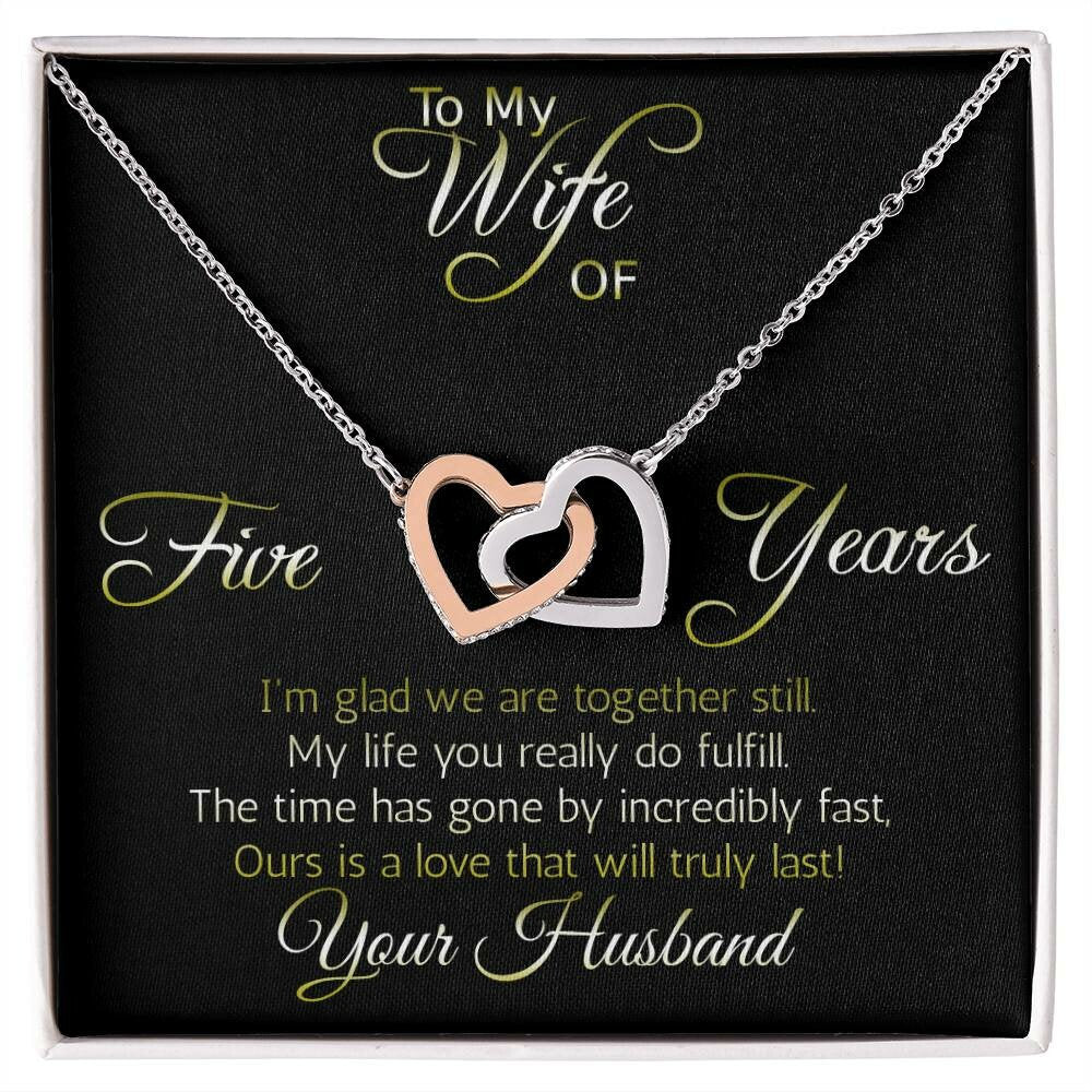 Awesome anniversary gift for wife: Five years: Interlocking hearts pendant; Love that will truly last.