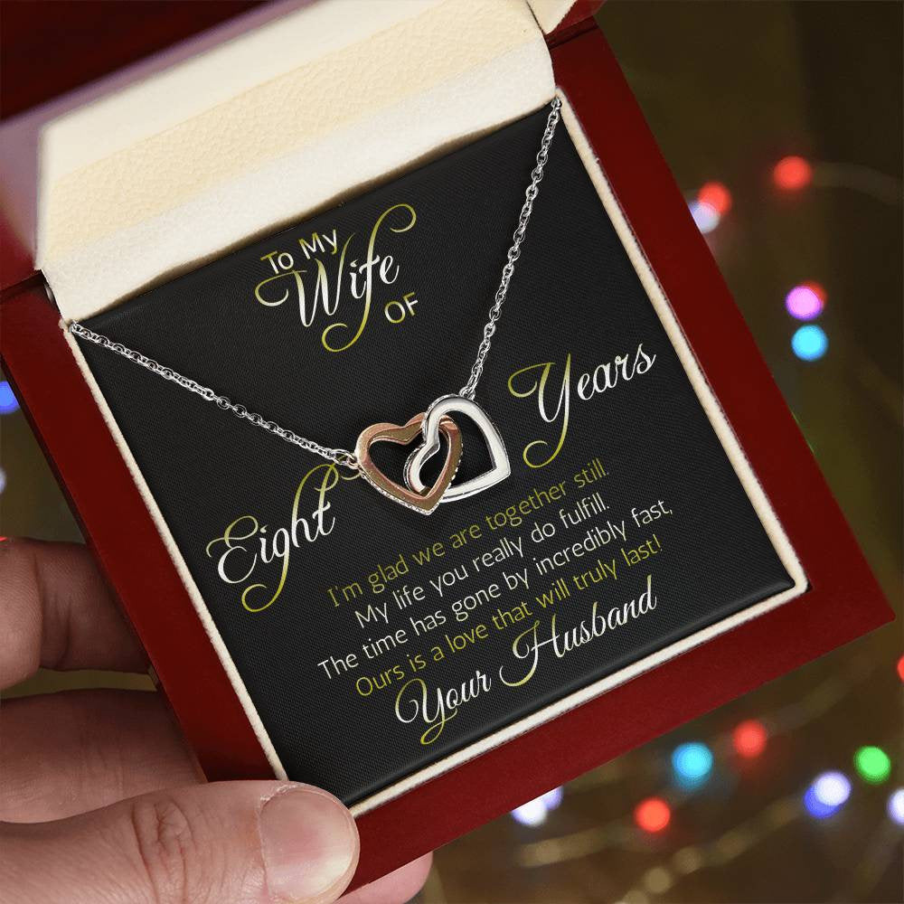 Amazing Eight year anniversary Gift: nterlocking hearts pendant; Love that will truly last.