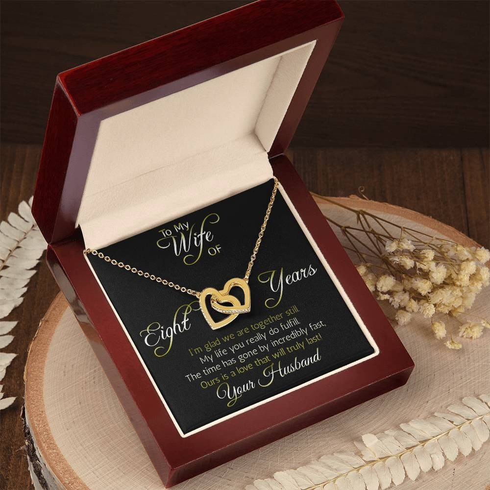Amazing Eight year anniversary Gift: nterlocking hearts pendant; Love that will truly last.