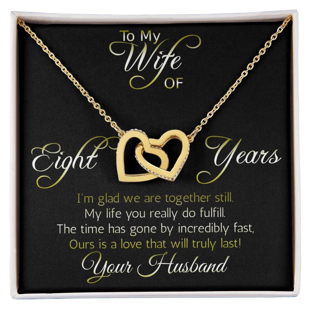 Amazing Eight year anniversary Gift: nterlocking hearts pendant; Love that will truly last.