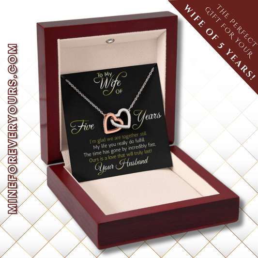 Awesome anniversary gift for wife: Five years: Interlocking hearts pendant; Love that will truly last.