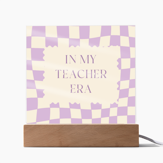 In my Teacher Era retro purple and cream decoration for classroom