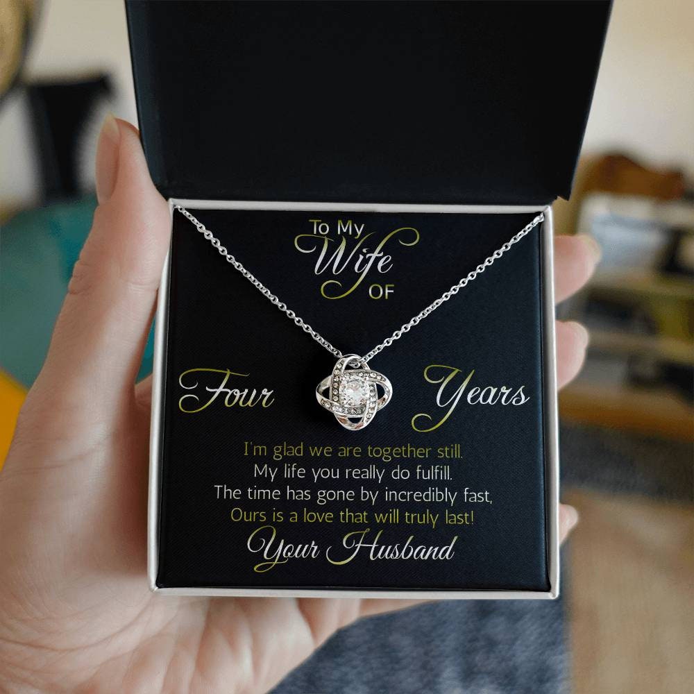 Four year anniversary necklace pendant, Love Knot... Love that will truly last. Show her that your love is intertwined!