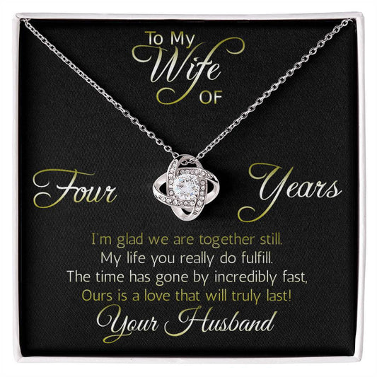 Four year anniversary necklace pendant, Love Knot... Love that will truly last. Show her that your love is intertwined!