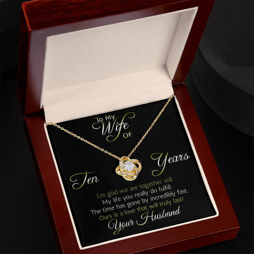 Ten year anniversary necklace pendant, Love Knot... Love that will truly last. Remind her you still love her!