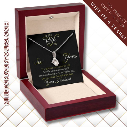 Fantastic 6 year anniversary gift: Aluring Beauty ribbon pendant reminds her that your love everlasting!